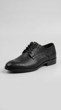 Scarpa Derby Artigianale in Vitello Stampato – side view on neutral background – Philip Zepter
